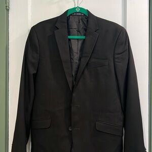Reaction Kenneth Cole - 2 piece suit. One jacket and one pair of pants.